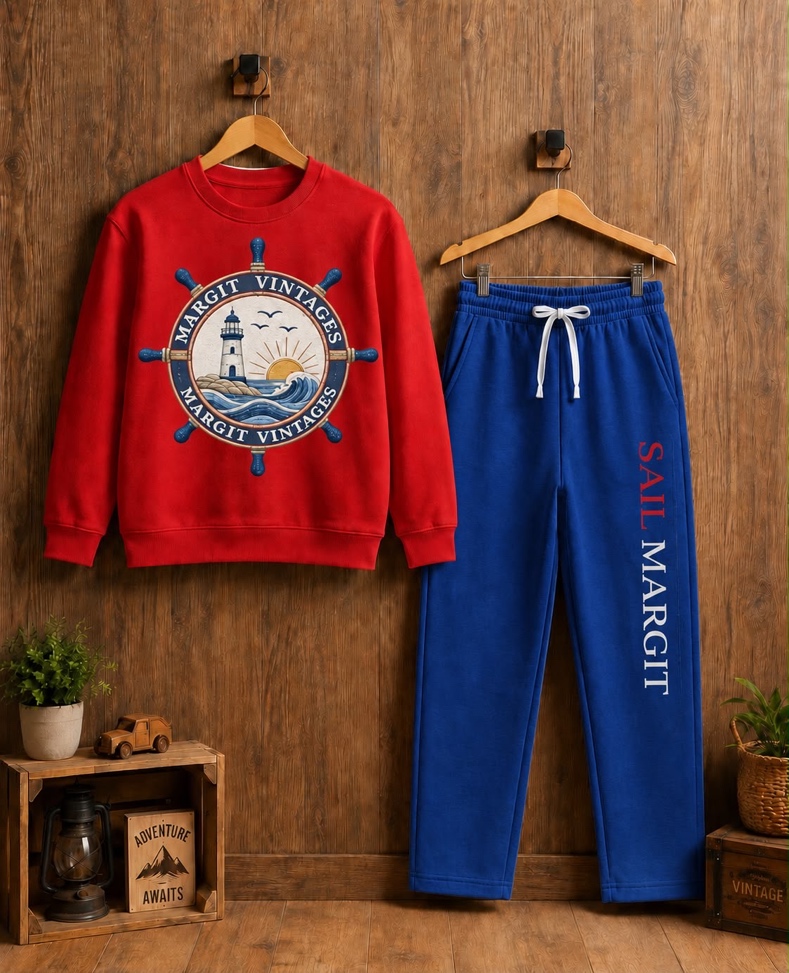 Red Margit Vintages sweatshirt with a ship’s wheel and blue track pants.